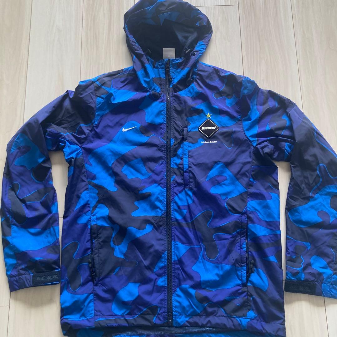 ぱき NIKE F.C.Real Bristol ナイロンジャケット 迷彩