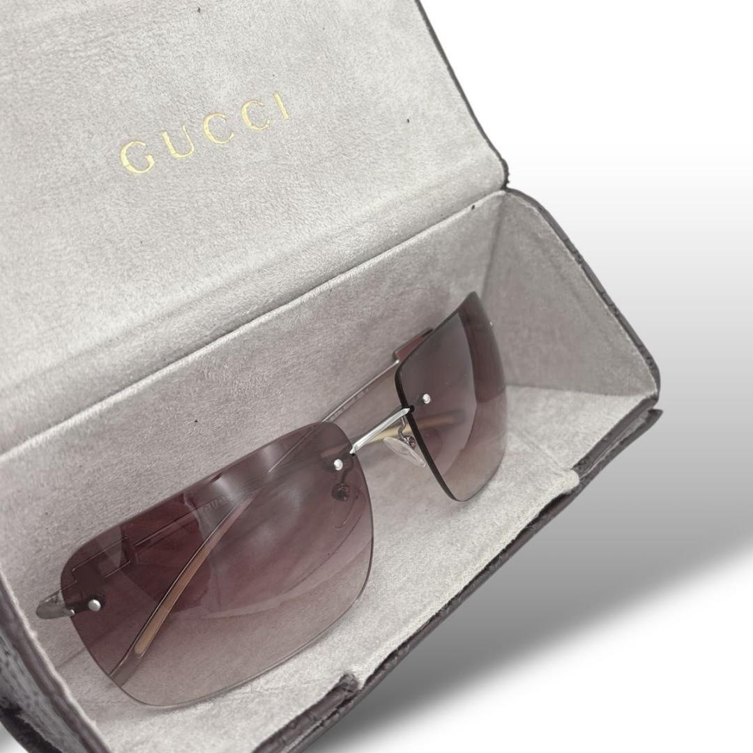 小物 GUCCI sunglasses rimless stone silver
