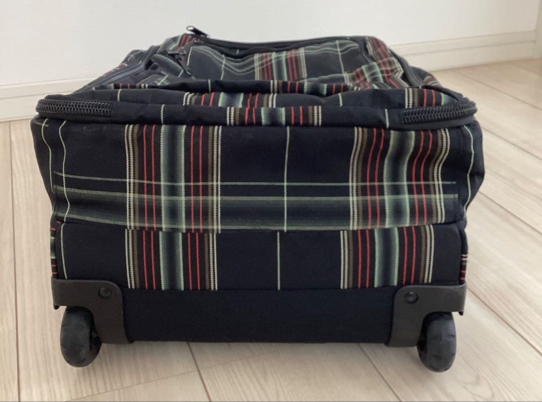 美品　DAKINE チェック柄 キャリーケース40L T字ハンドル