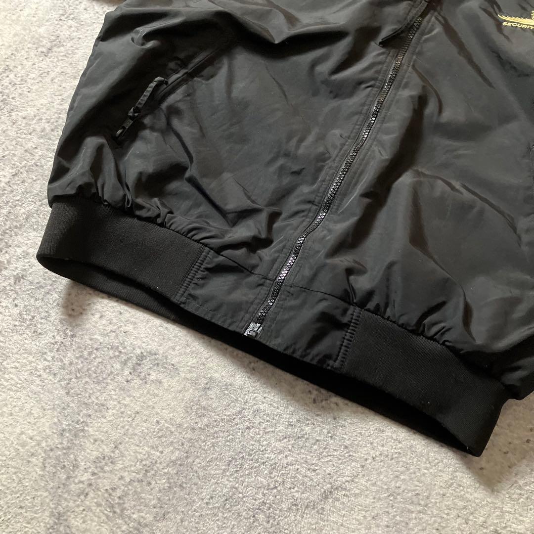 00sTRIMOUNTAIN企業ロゴウォームアップジャケットナイロンブラック黒M