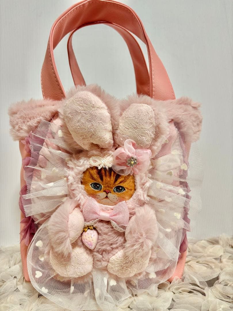 コヤンイサムチョン　フェイクレザーピンクのトートバッグ