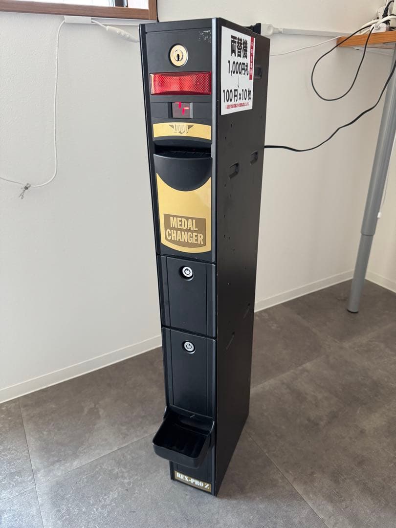 ミ*ズ様 両替機　1000円→100円×10枚新札不可