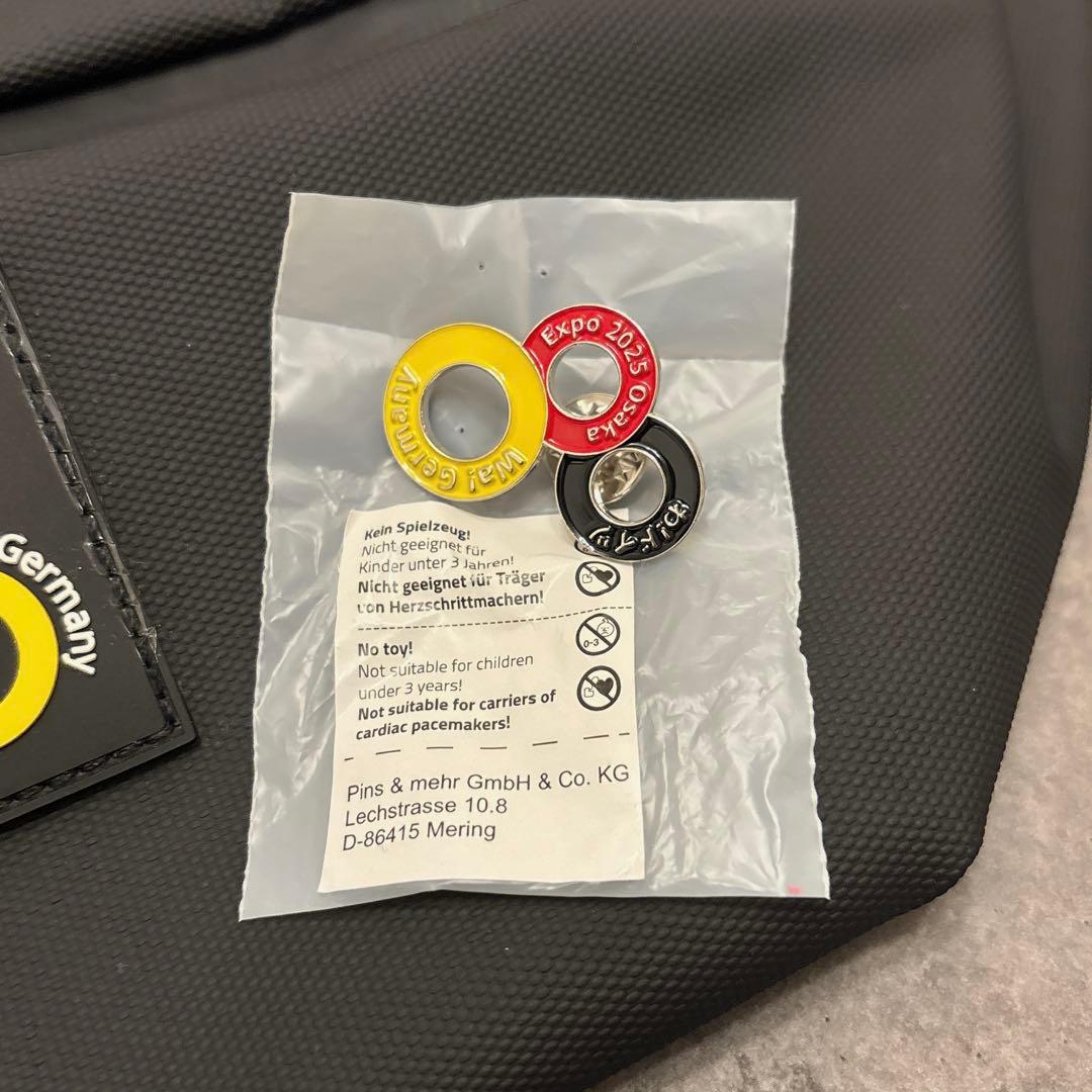 【新品】大阪 関西万博 ドイツ館 ボディバッグ ウエストバッグ、ピンバッジ