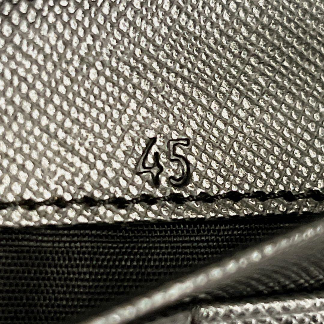 プラダ　長財布　三角ロゴプレート　ロングウォレット　ブラック　ナイロン　レザー