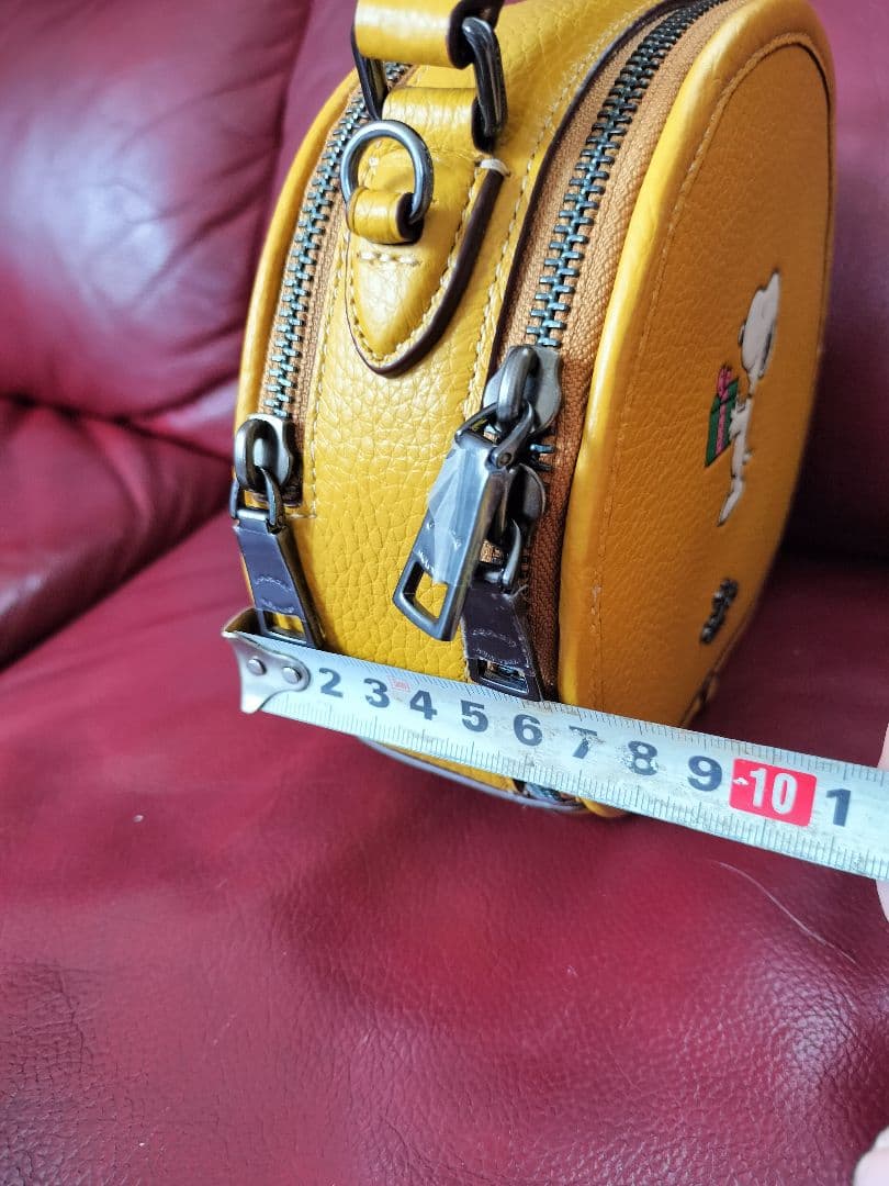 COACH スヌーピー 円形ポシェット
