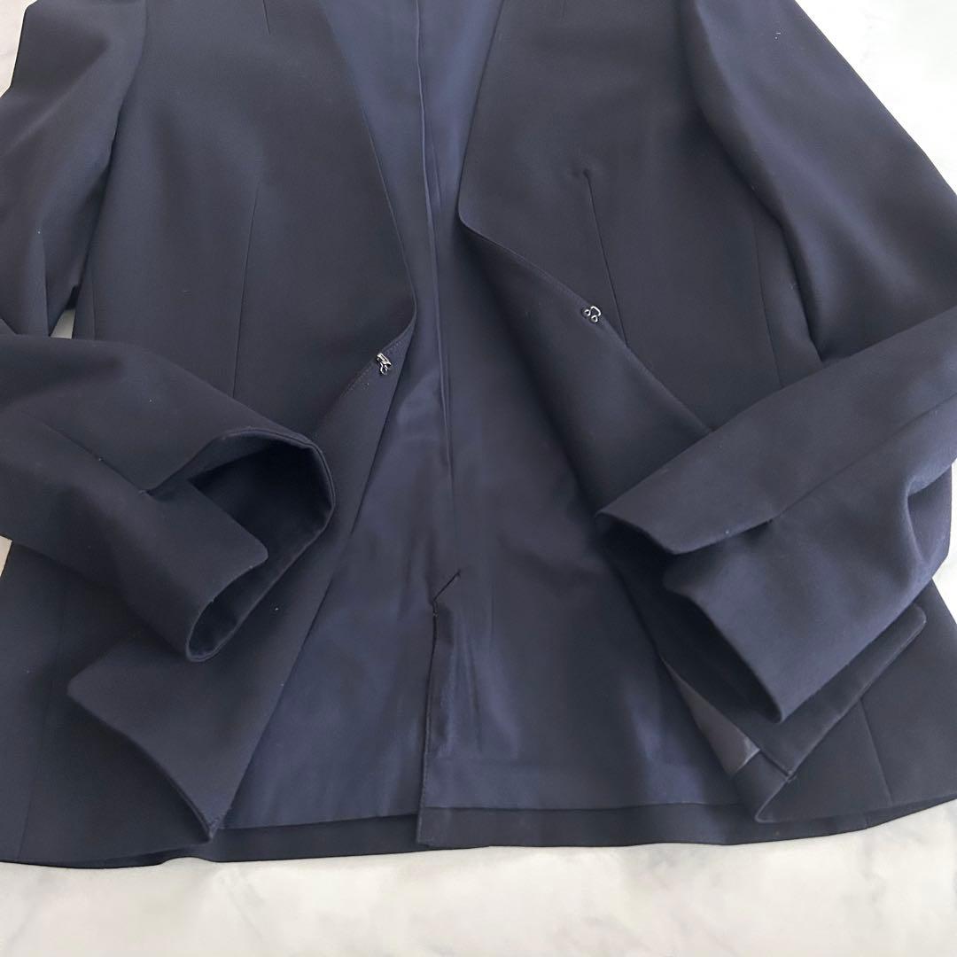 さ*く様 美品 ノーカラーパンツスーツ 洗えるセットアップ 紺 ネイビー M ワ