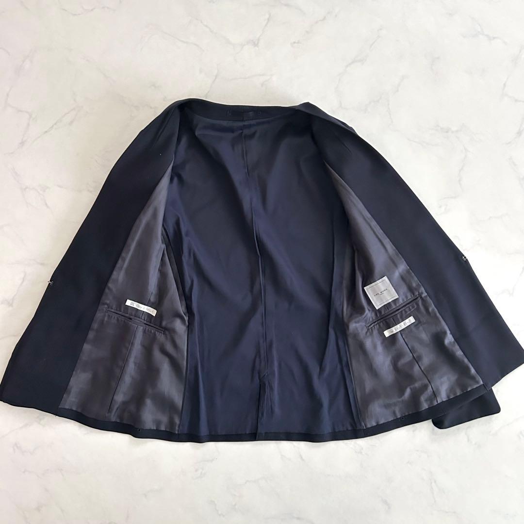 さ*く様 美品 ノーカラーパンツスーツ 洗えるセットアップ 紺 ネイビー M ワ