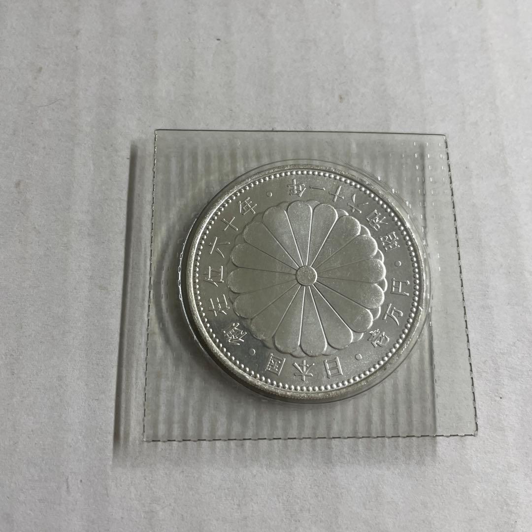 天皇在位60周年記念一万円銀貨