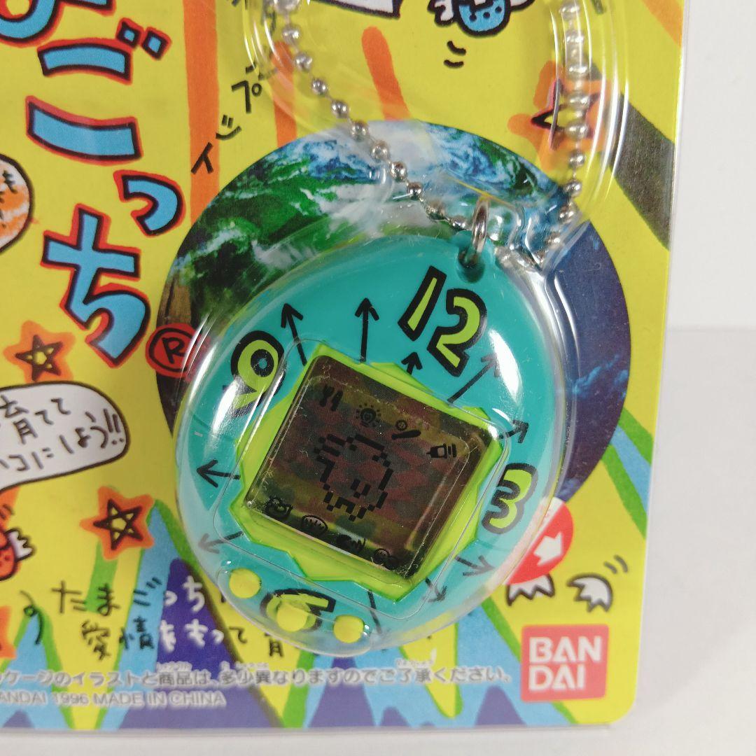 【激レア・たまごっち ２個セット 赤色＆緑色時計柄】 未開封 ３０年前 希少