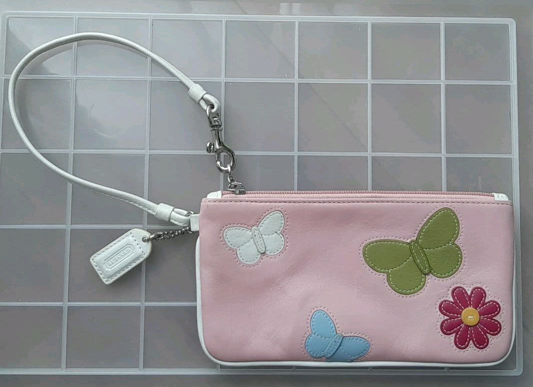 COACH　限定品　本革ポーチ 　蝶とお花