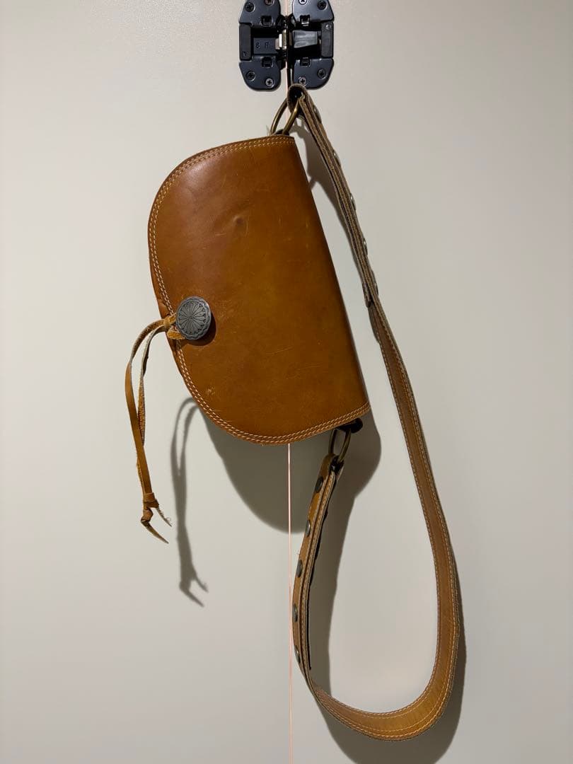 レザーポーチ　レザーバッグ　バケットバッグ　メディスンバッグ　コンチョ