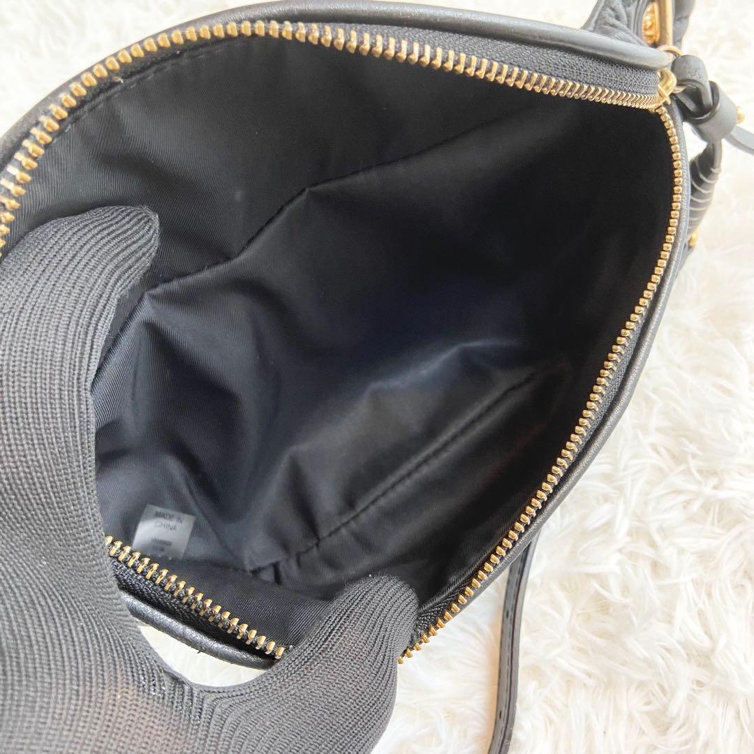 トリーバーチ ボディバッグ フレミング エンボス タッセル レザー ブラック