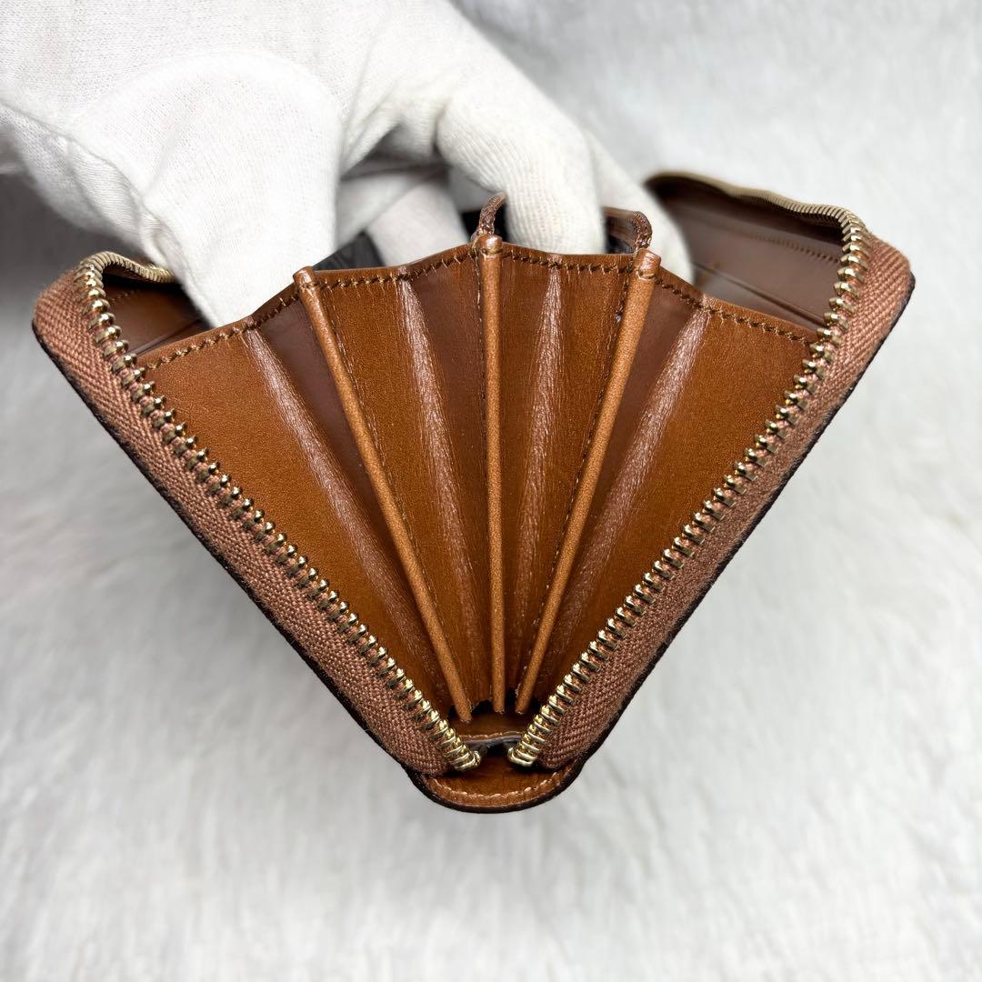✨訳あり美品✨ グッチ GGスプリーム ラウンドジップ 長財布 PVC ブラウン