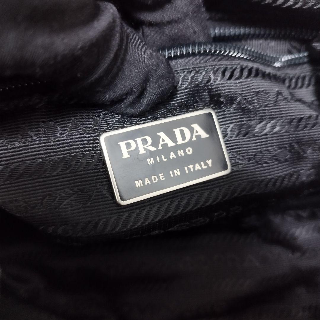 美品☆　プラダ　リュック　ベルト　フラップ　三角ロゴプレート　レザープレート