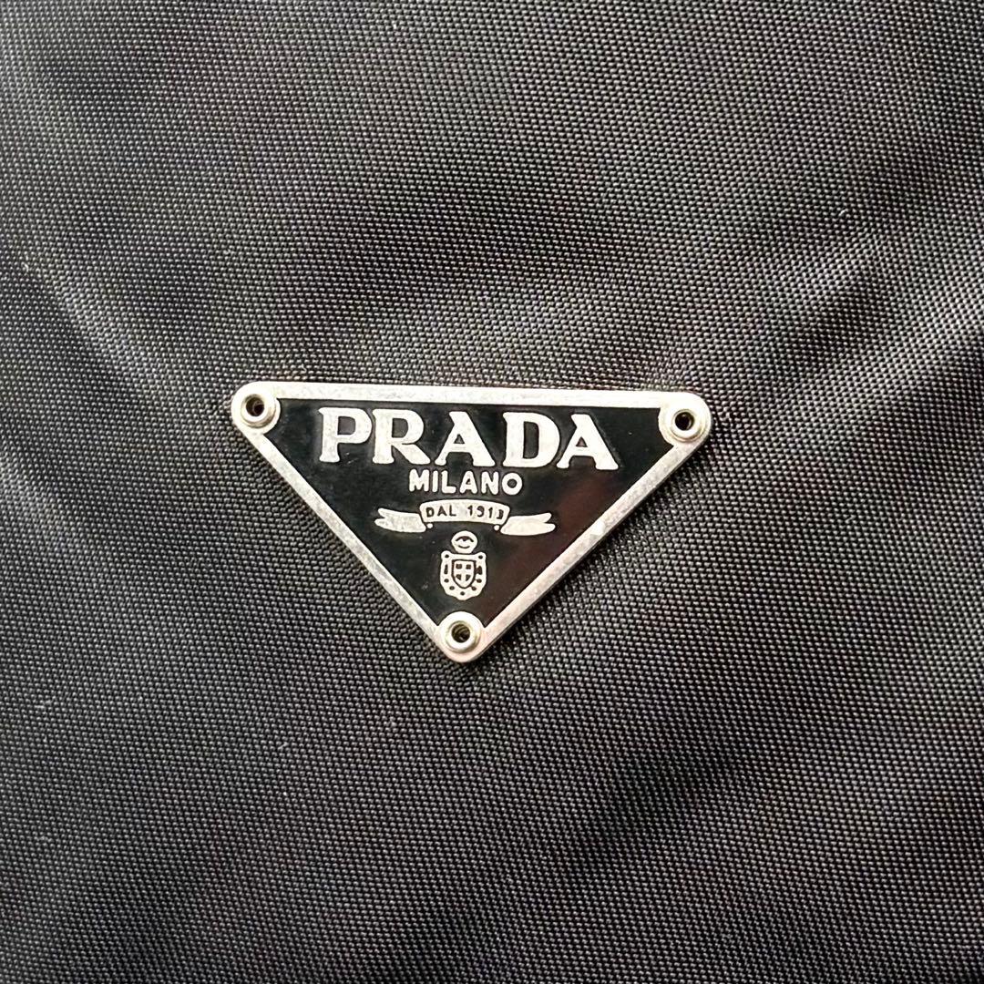 美品✨プラダ 巾着 ポーチ ナイロン レザー 三角ロゴ 白タグ ブラック