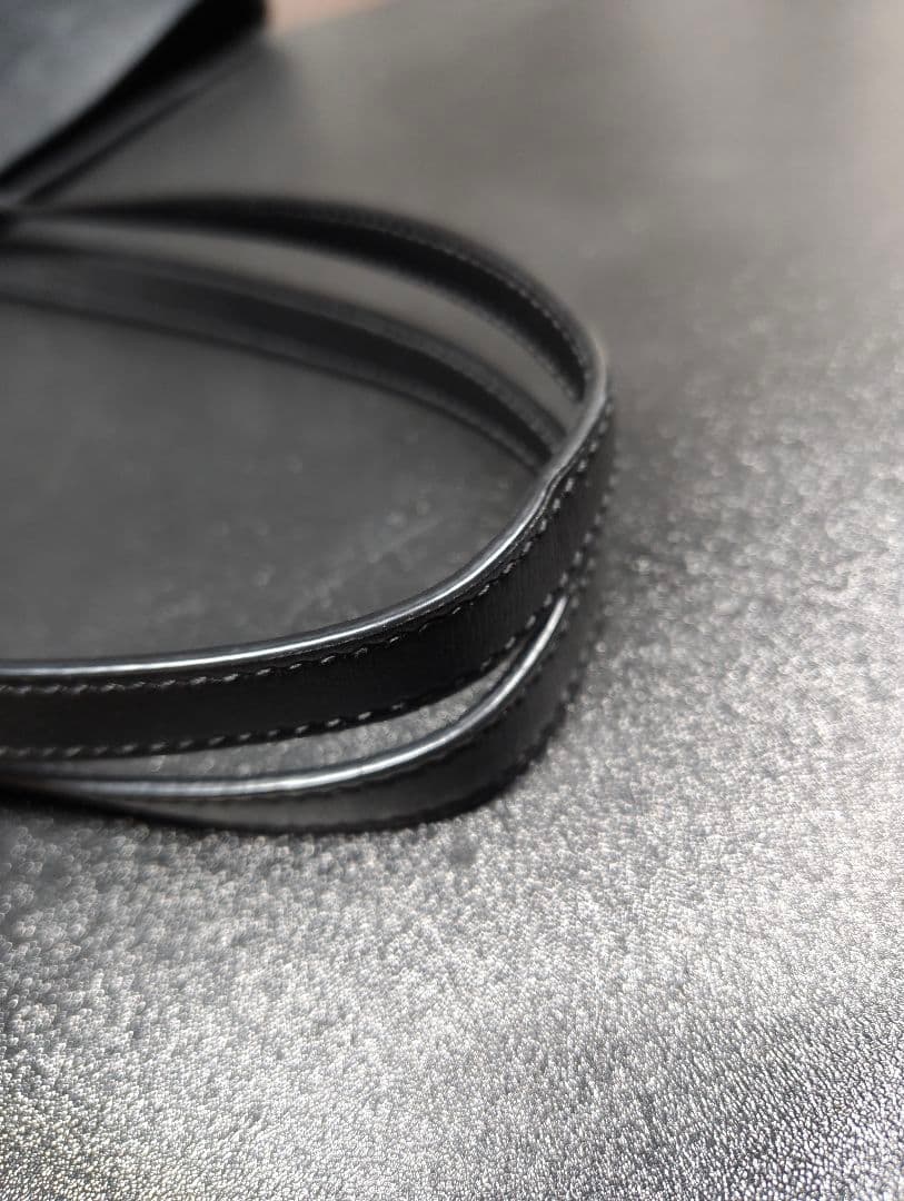 サン・ローラン　パンチングトートバッグ　黒