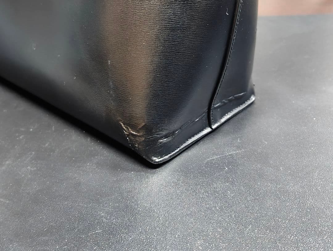 サン・ローラン　パンチングトートバッグ　黒