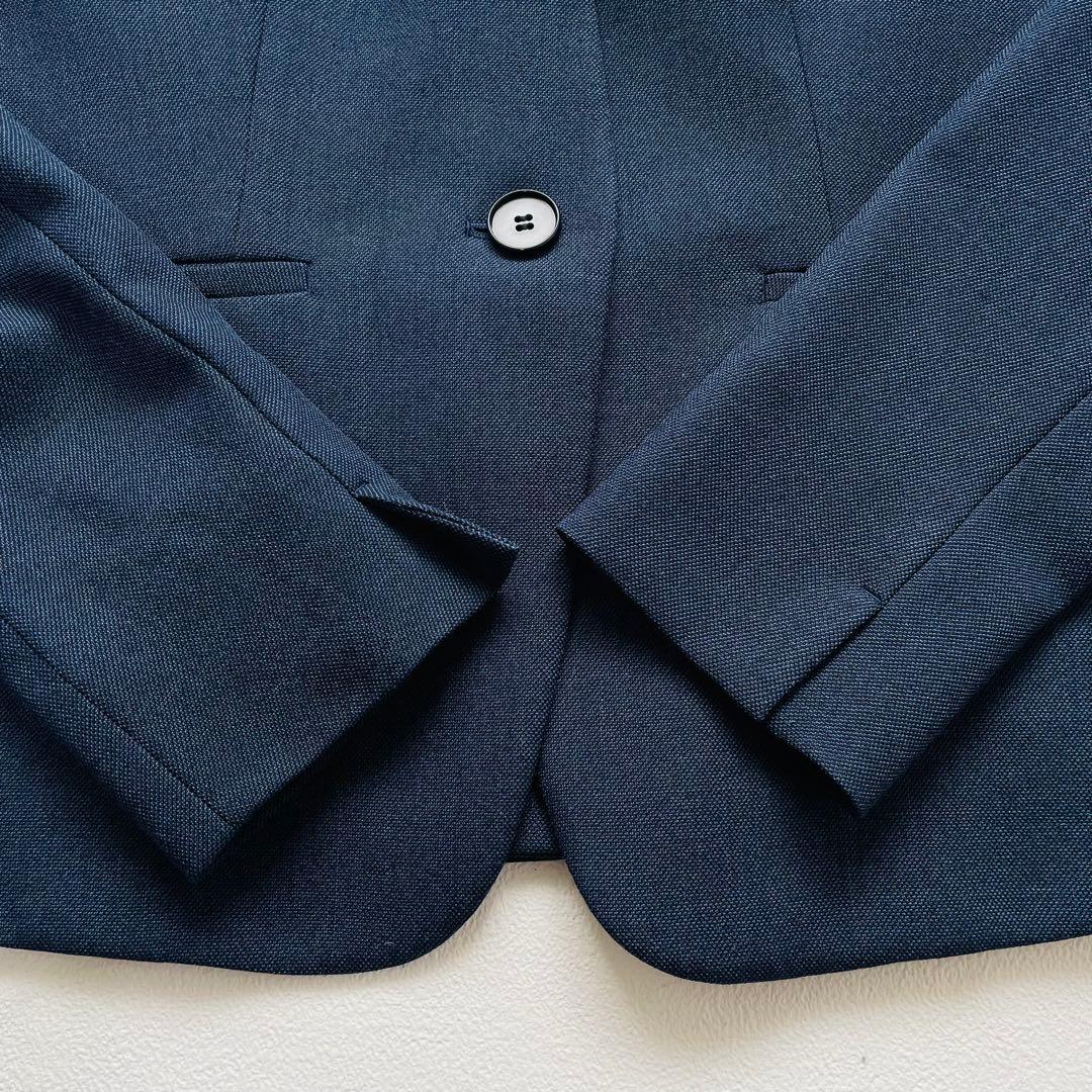 インディヴィ ノーカラー ワイドパンツスーツ ネイビー ストレッチ 洗える