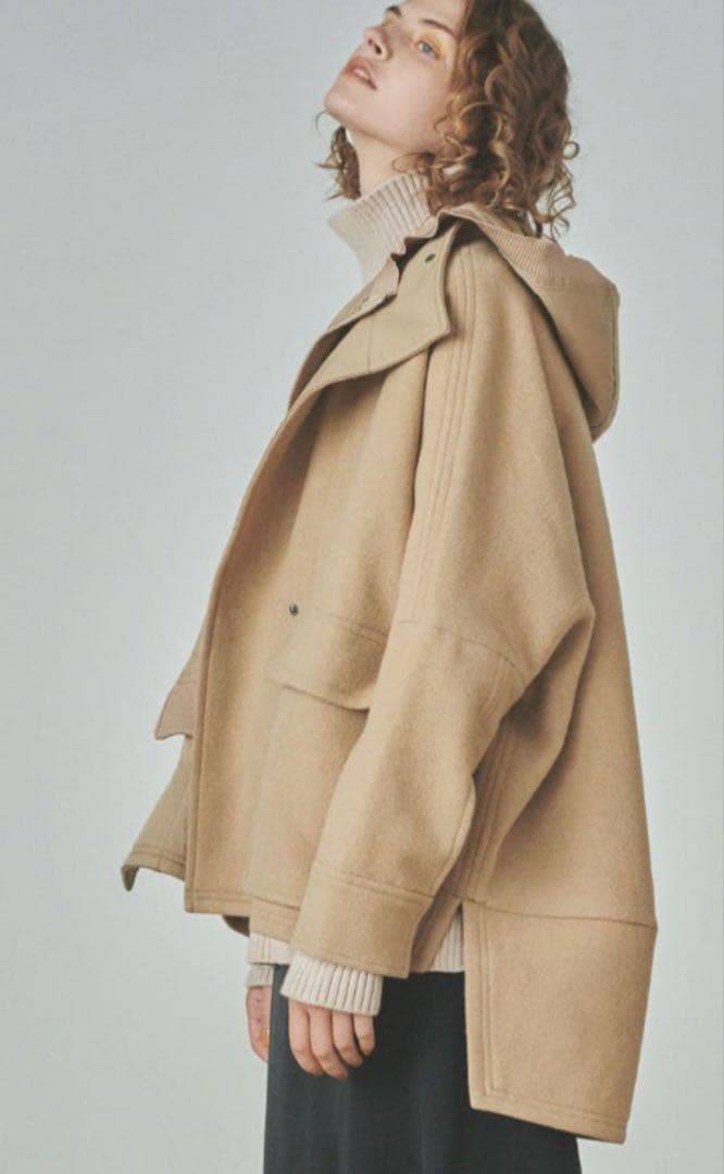 emmi オーバーウールスウィッチコート