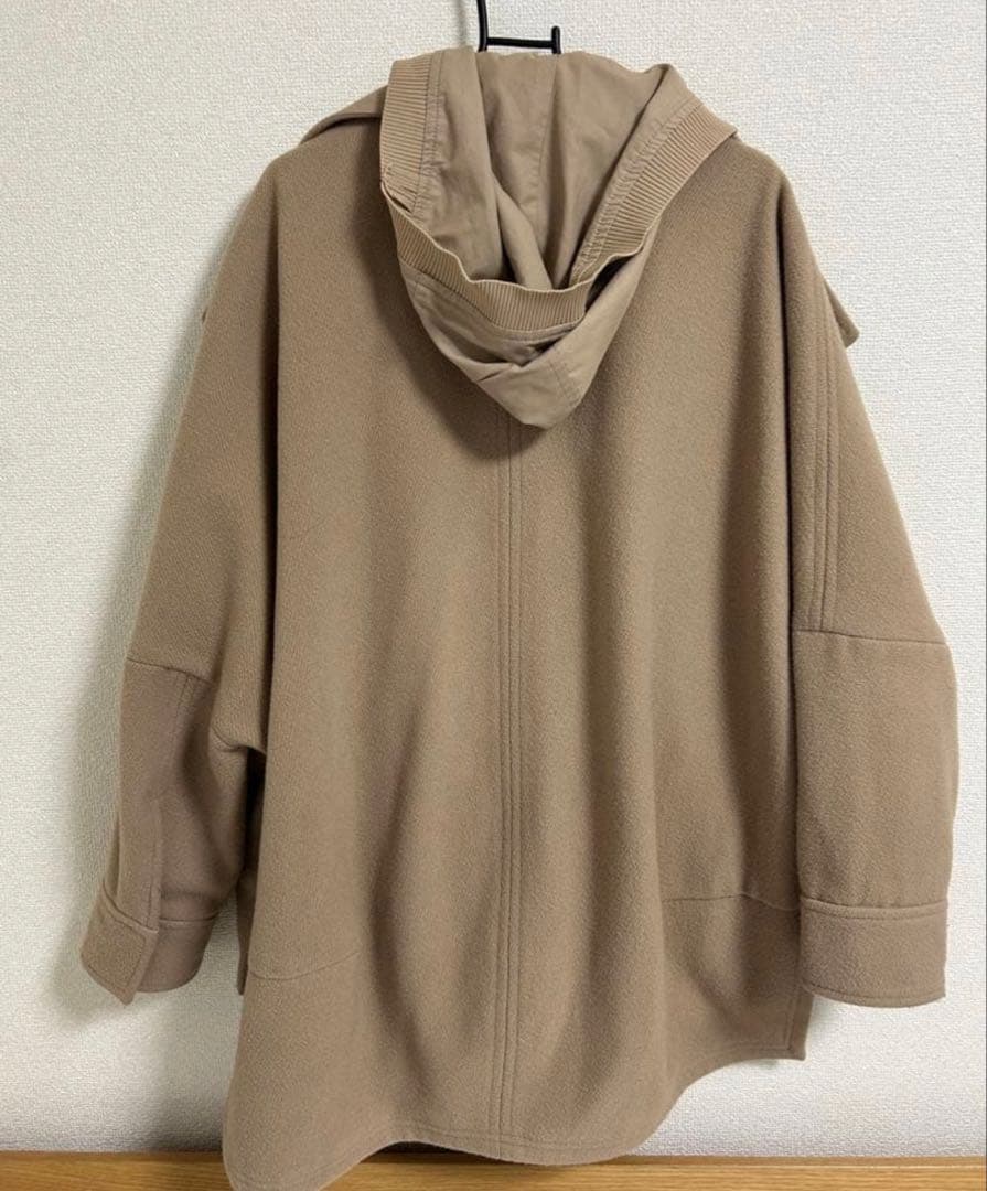 emmi オーバーウールスウィッチコート