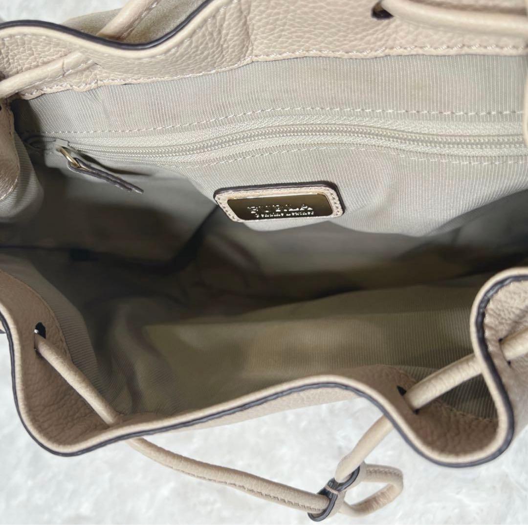 未使用級✨フルラ ミニリュック レザー ロゴ 巾着型 袋付き ベージュ