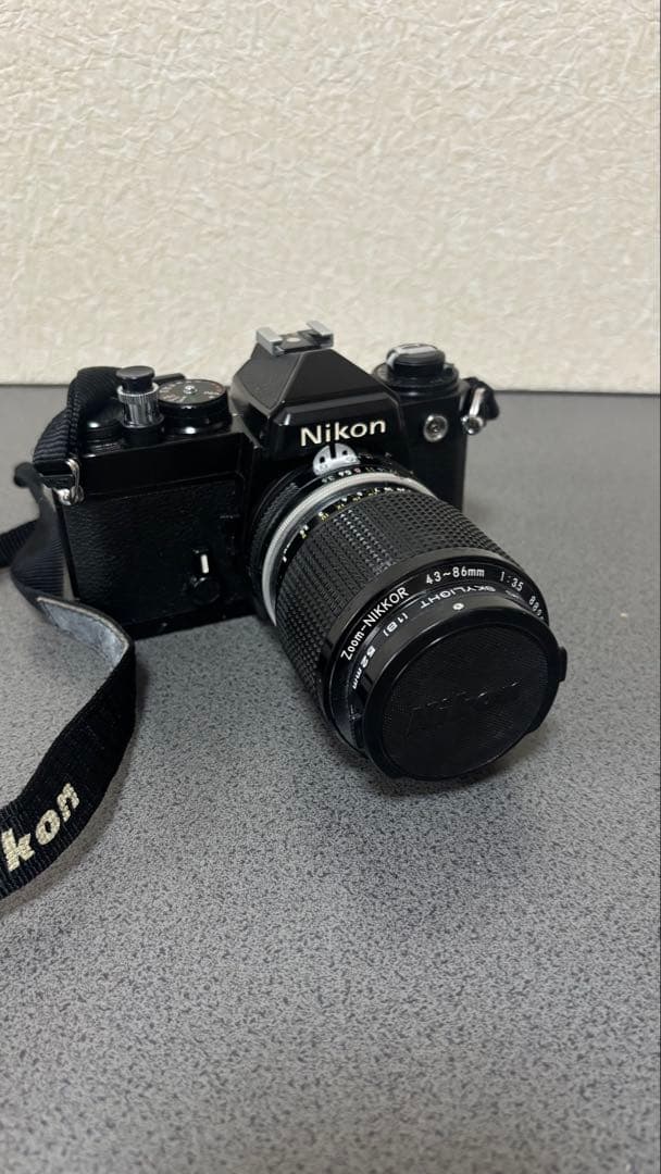 一眼レフカメラNikon FE 43-86mmレンズ付き　。モータードライブ。