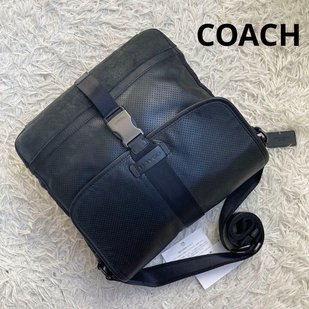 COACH フライトバッグ 黒 ブラック パンチング レザー 革 バックル