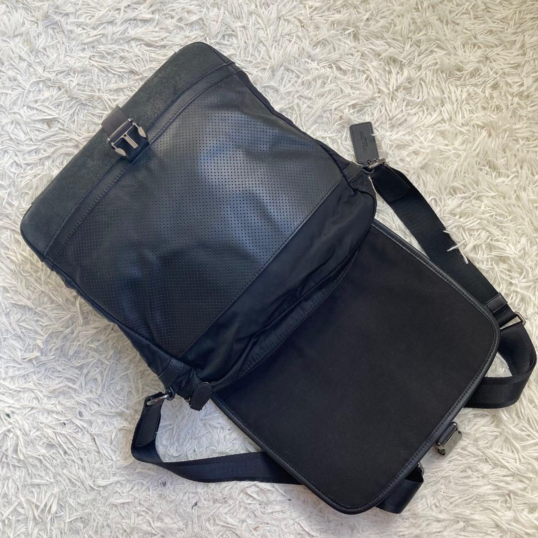 COACH フライトバッグ 黒 ブラック パンチング レザー 革 バックル