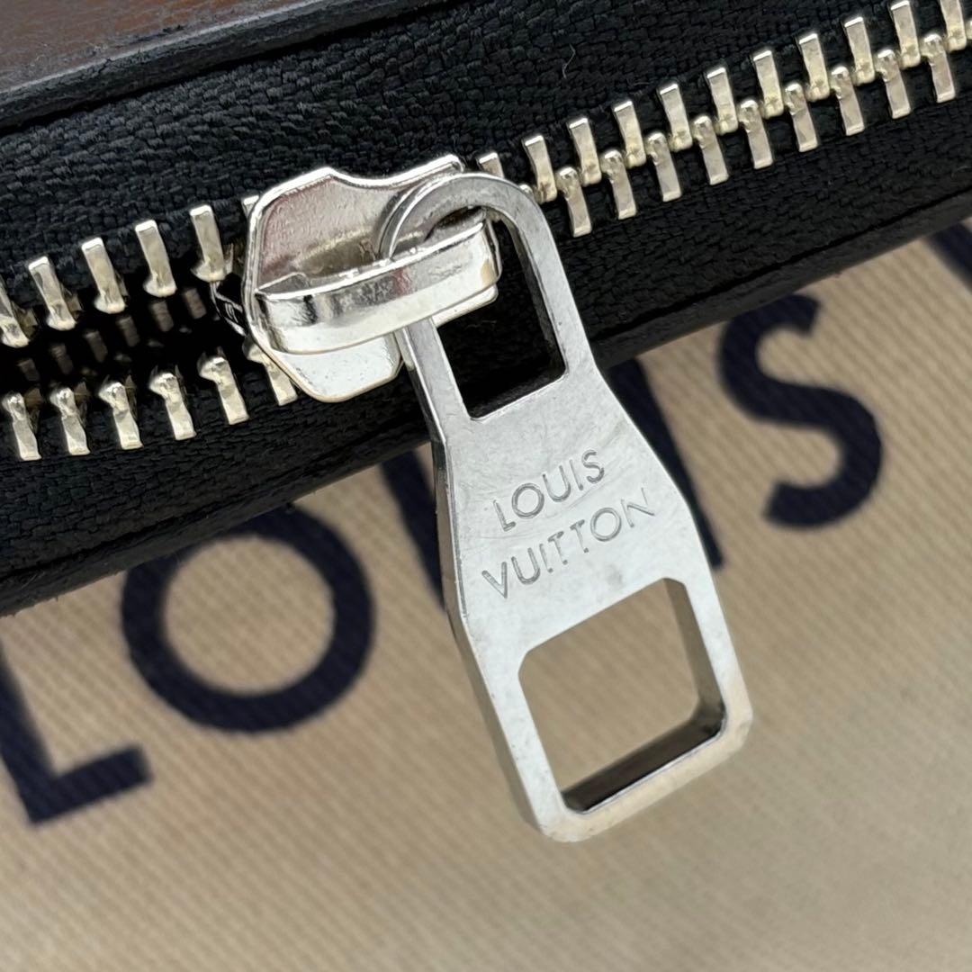 ルイヴィトン　トリヨン　ヴェルティカル　ジッピーウォレット　長財布　M58412