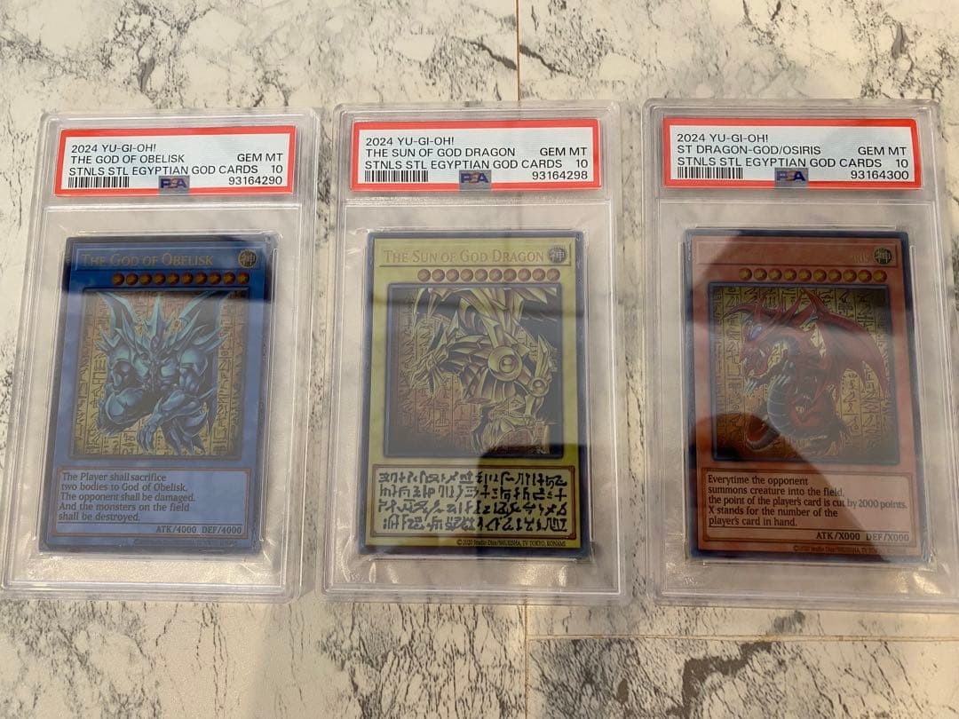 遊戯王 極美品 三幻神 ステンレス製 PSA10 3枚セット価格