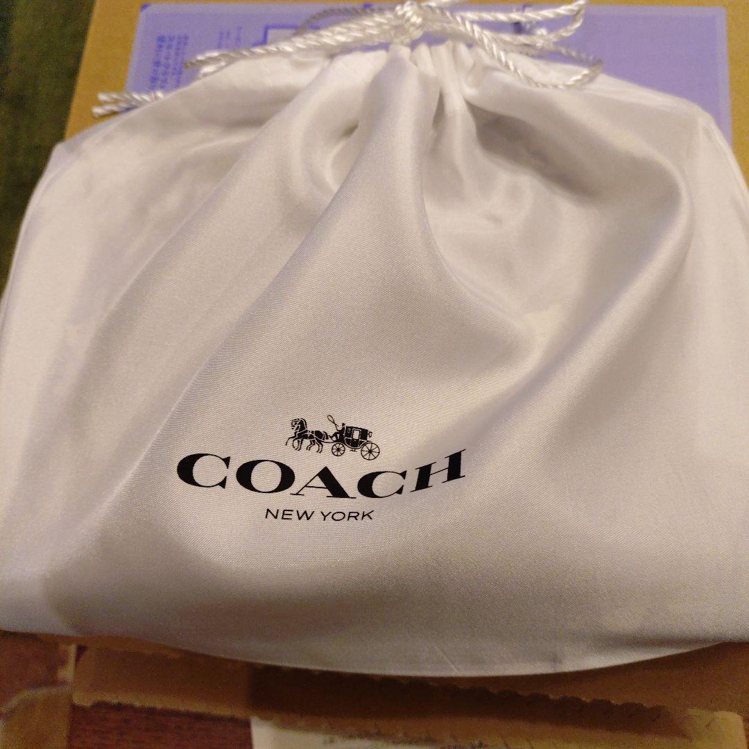 コーチ　スヌーピーコラボ　ノートブックシグネチャーキャンバス