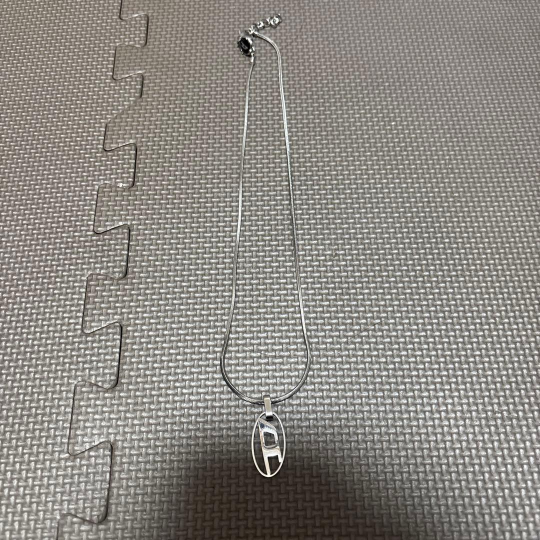 DIESELシルバー オーバル型ペンダント ネックレス