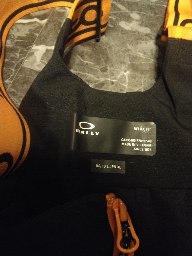 OAKLEY スノーボードウェア XL オレンジ 10K