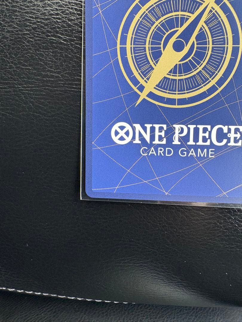 ワンピースカード シャンクス　金背景sp コミパラ　３周年　パラレル