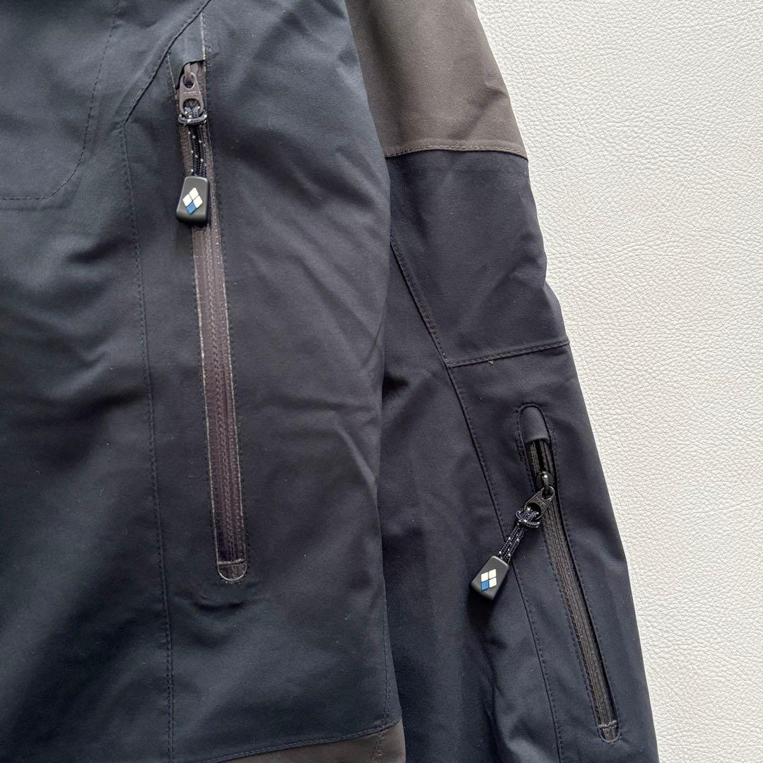 02229 モンベル　シャルモパーカ　スキーウェア　ダウンジャケット グレー