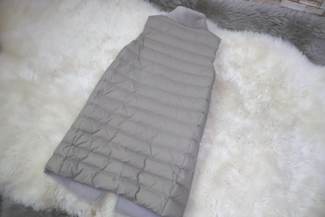 Sov ソブ の ムートン 毛皮ファーを使用した ダウン ジレ コート