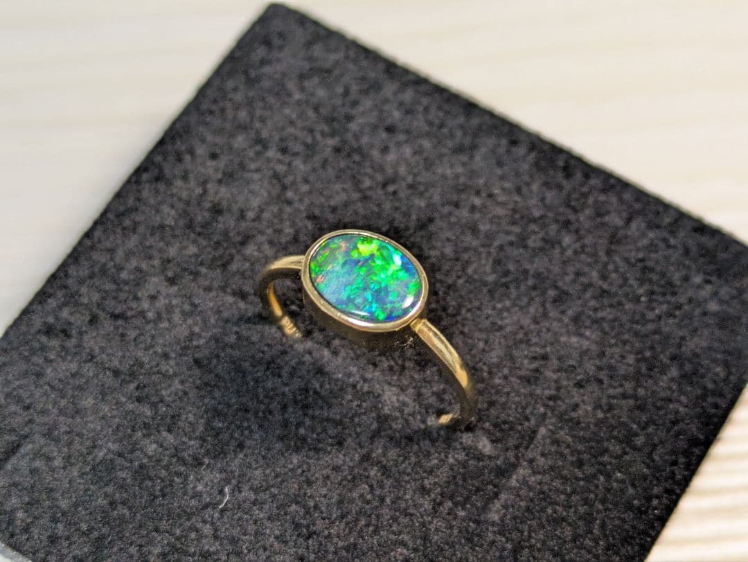 K18 0.77ct 12号 ボルダーオパールリング