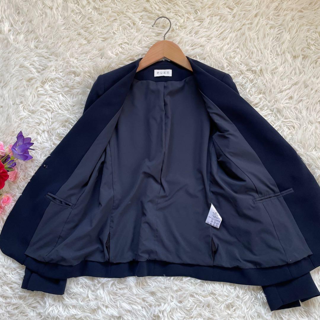 PLSTプラステ ネイビーノーカラージャケットパンツスーツセットアップ洗える