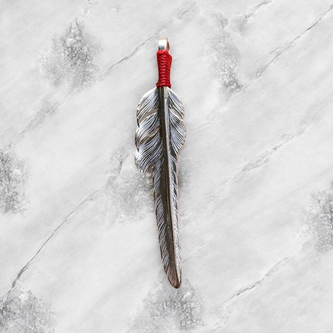 Larry smith 紐巻き風切りフェザーLサイズ　ペンダント