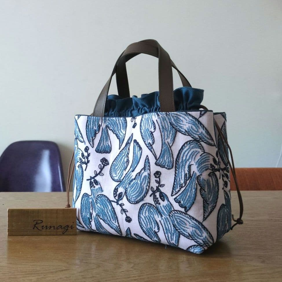 【1565】あおりポケットの巾着バッグ＊ミナペルホネン