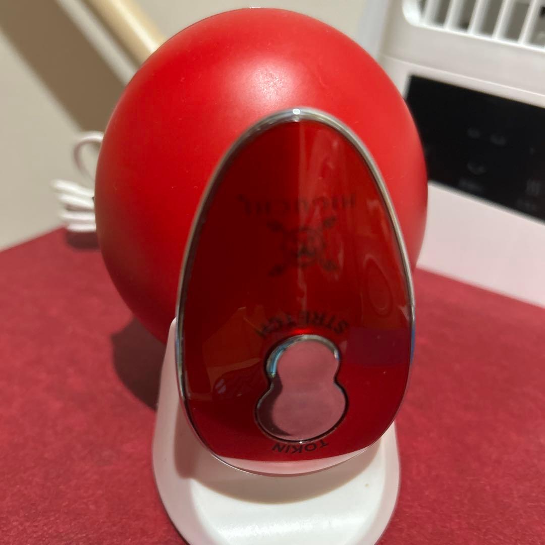 赤い卵型マッサージ器
