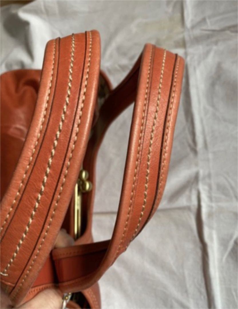 コーチ　オレンジ　エルゴレザープリーテッドフレームドサッチェル