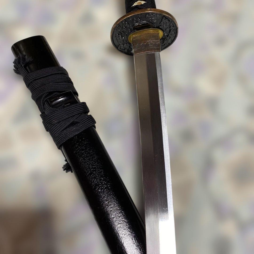 上級模造刀 黒柄 雲龍金縁楕円鍔