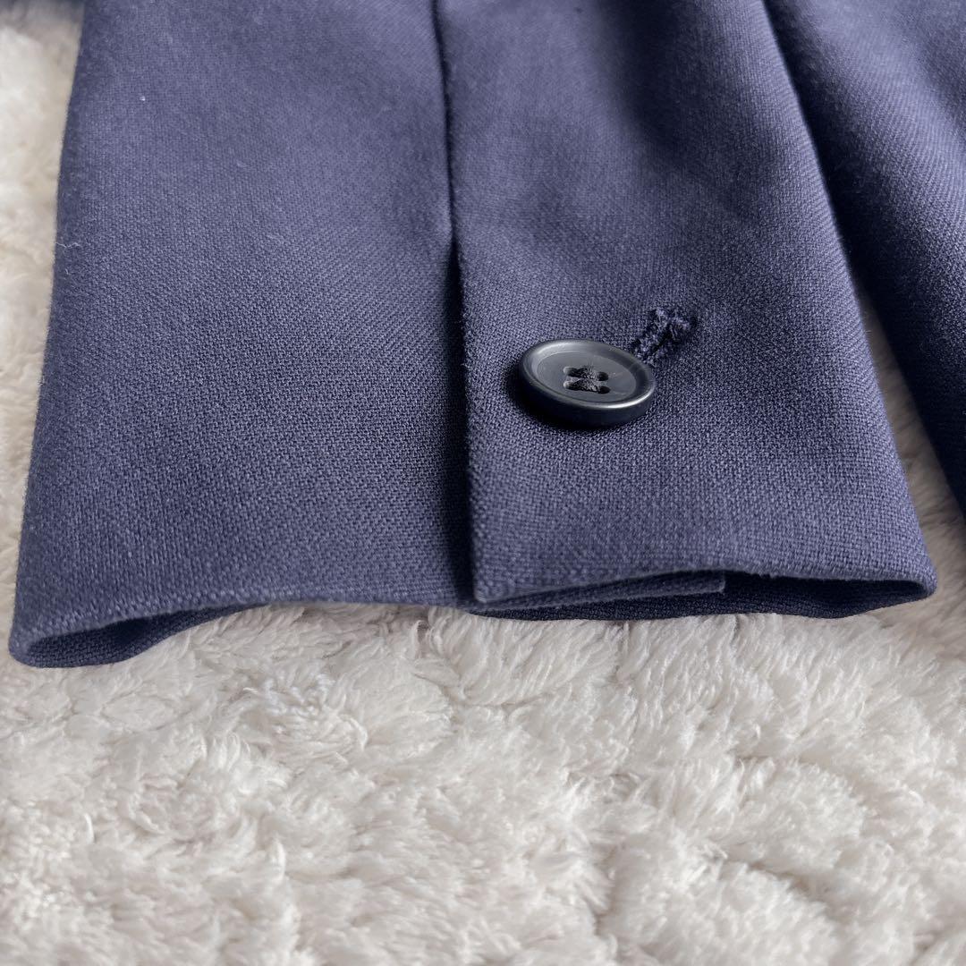 プラステ ノーカラーパンツスーツ ブラッシュドバック S/XS ネイビー