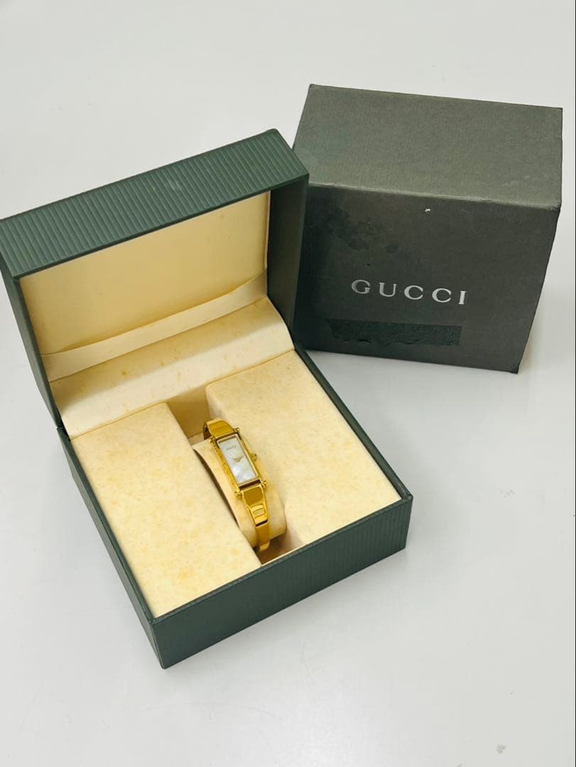 【電池交換済】グッチ レディース 腕時計 1500 白文字盤 シェル ゴールド