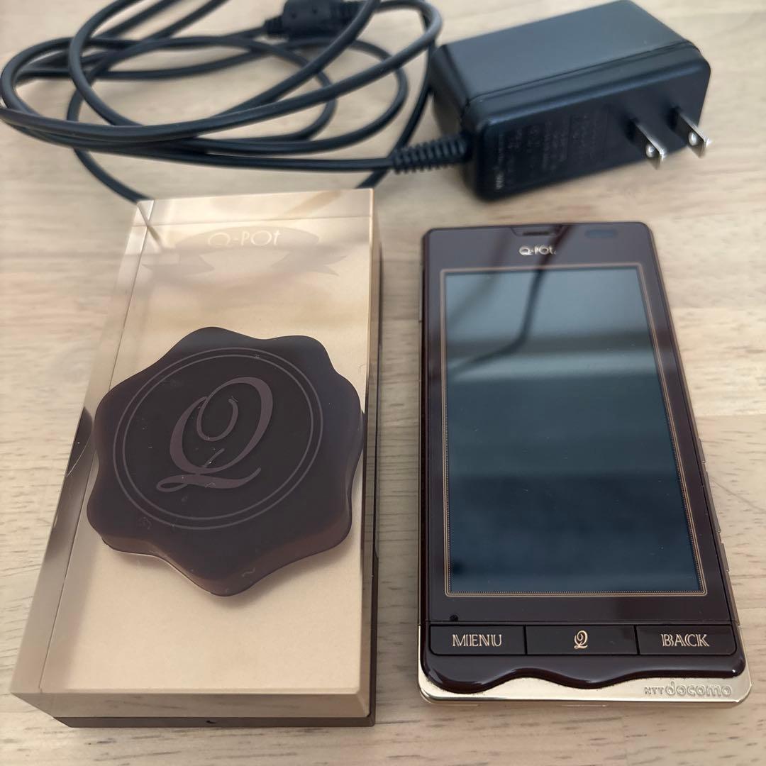 Q-pot.スマートフォン　チョコレート　ジャンク品