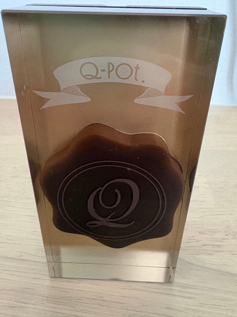 Q-pot.スマートフォン　チョコレート　ジャンク品